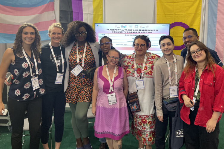 Trans activists together at AIDS 2022 Conference